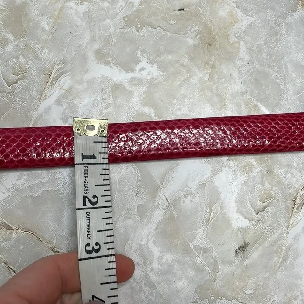Contemporary red snakeskin belt